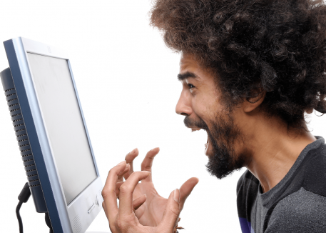 man getting frustrated with computer