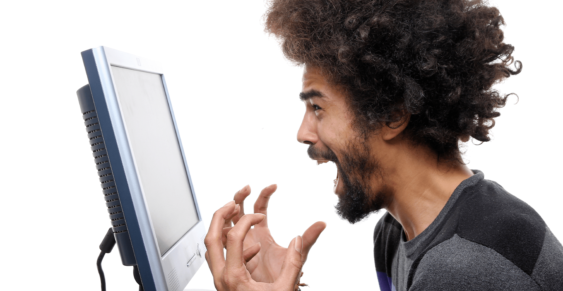 man screaming at computer