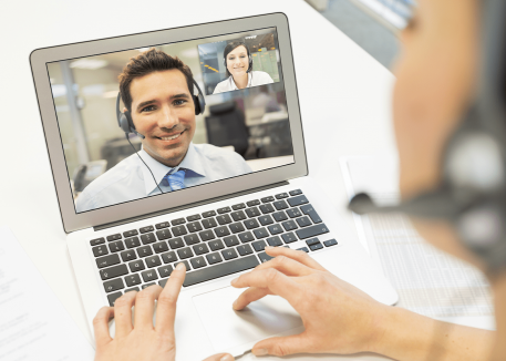 two business associates skyping