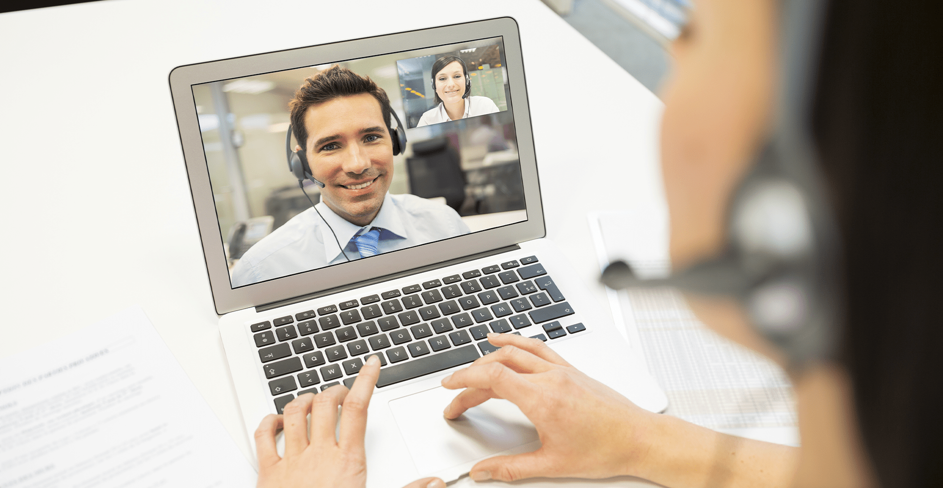 two business associates skyping