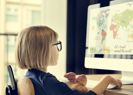 kid playing educational game