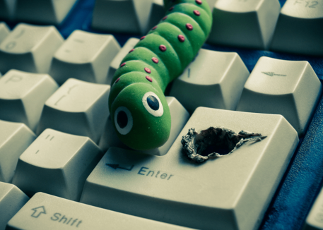 virus crawling out of keyboard