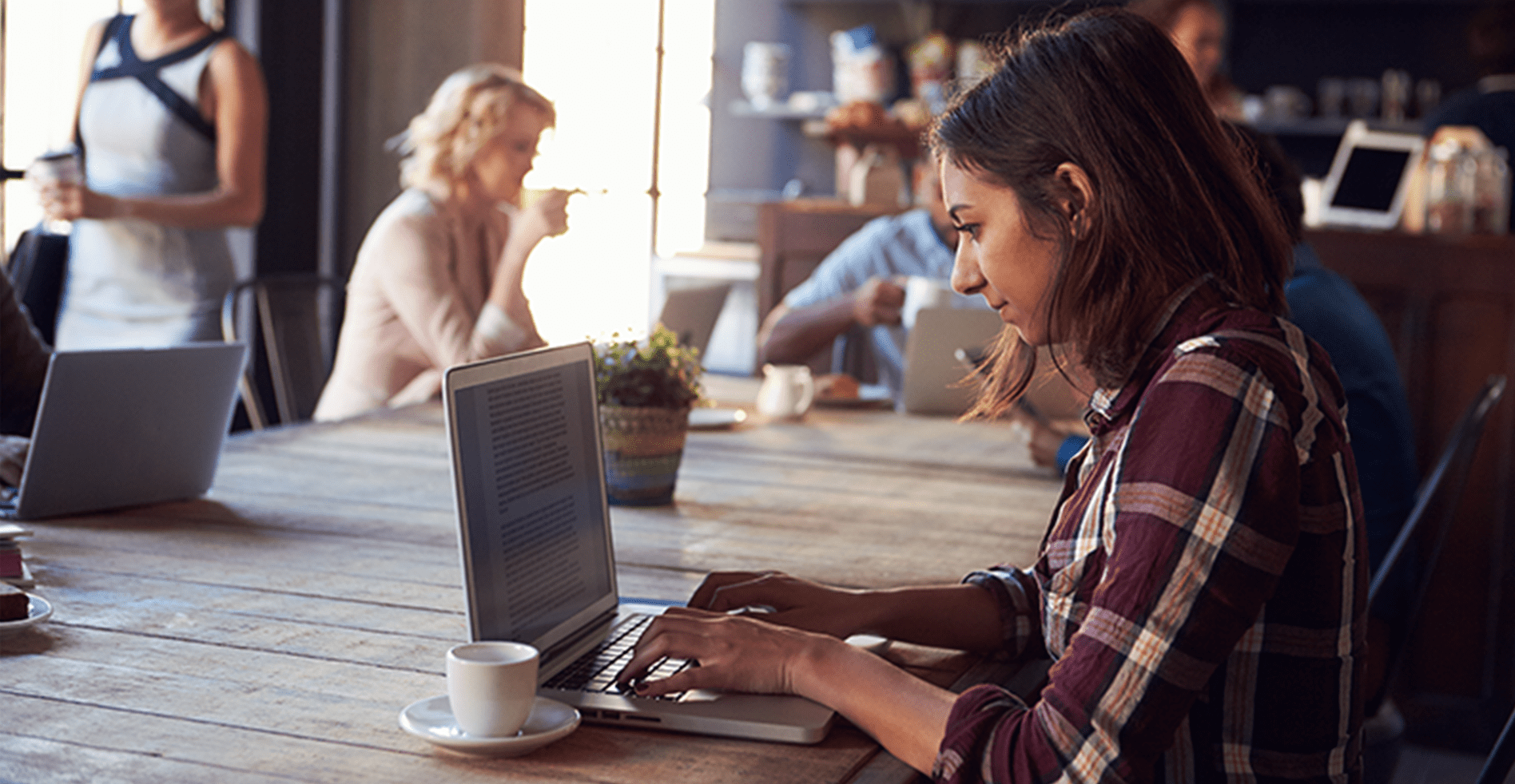 woman using laptop on wifi