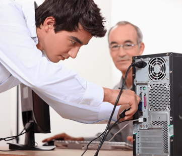 technician fixing home computer