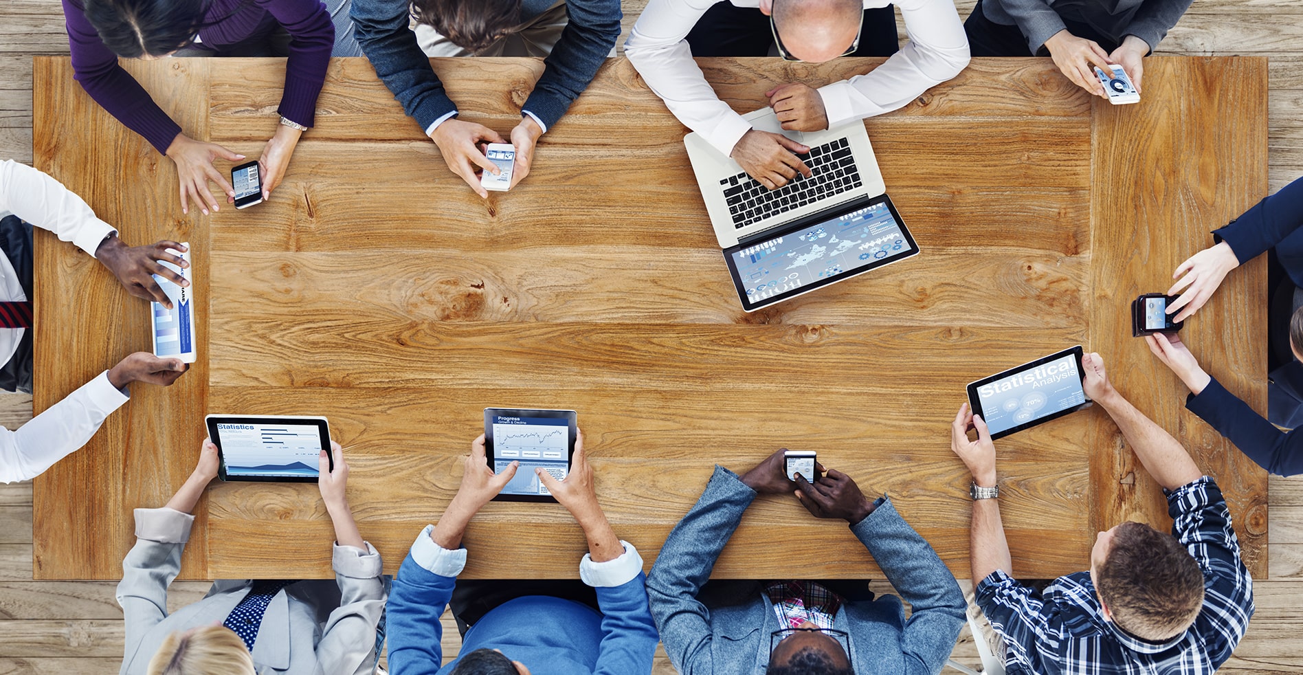 overhead view of small business using it support for their technology