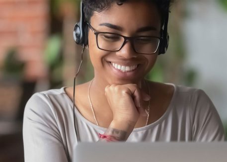 woman on phone call using pc computer