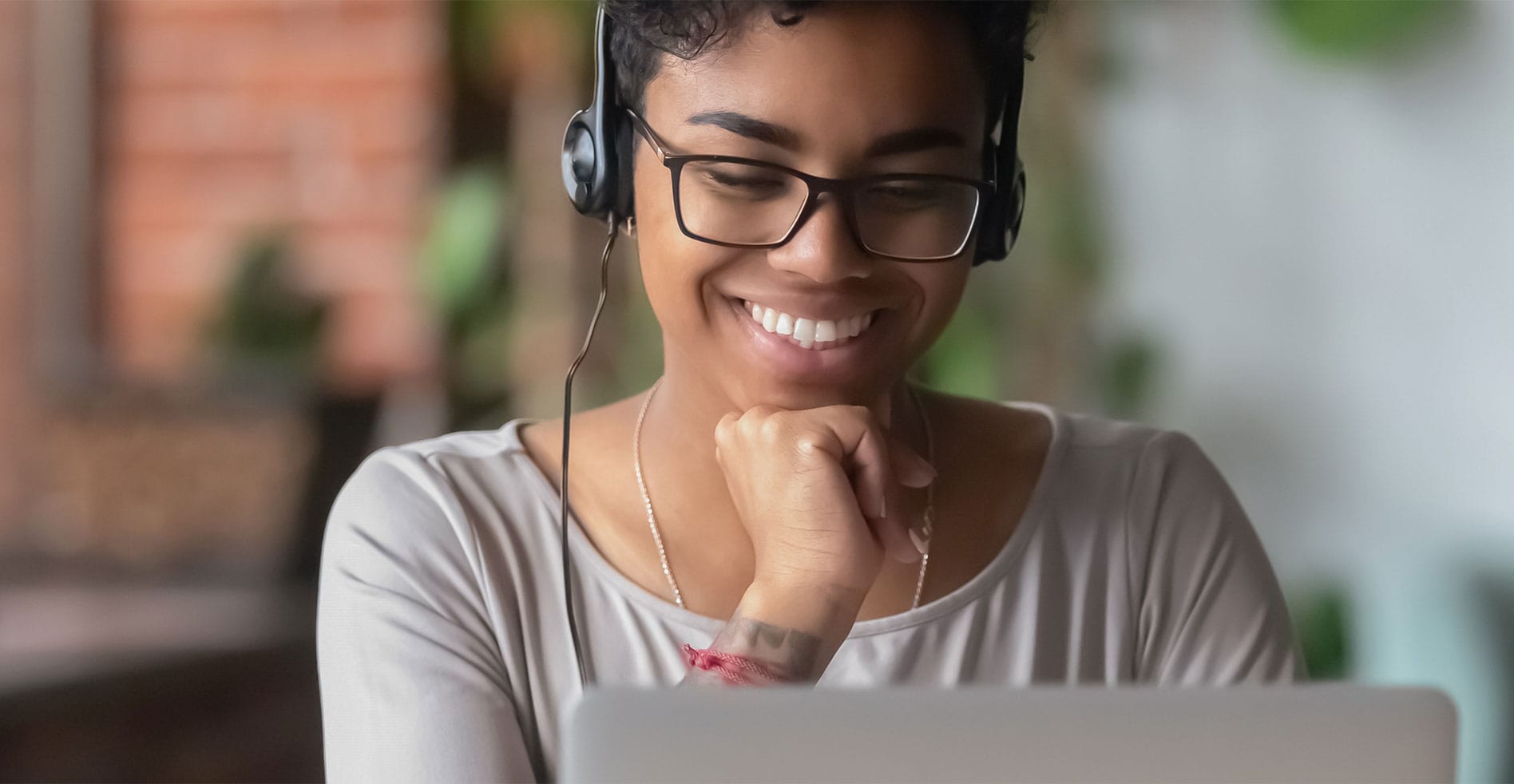 woman on phone call using pc computer