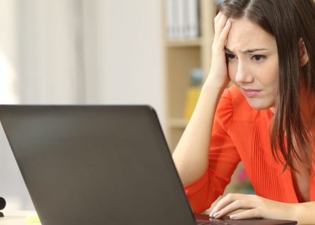 woman experiencing windows 10 issues on her laptop