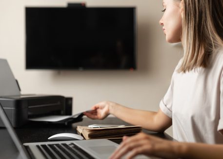 woman setting static IP address on home printer