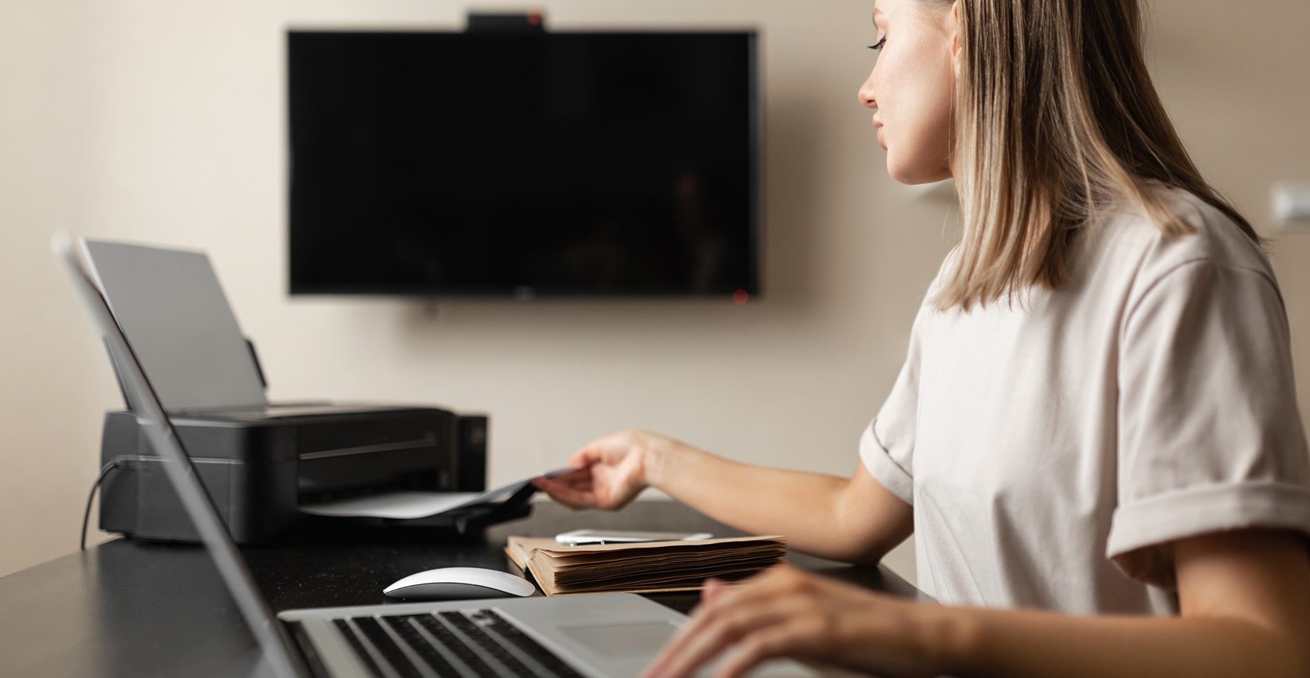 woman setting static IP address on home printer