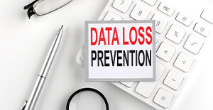 data loss prevention sign on desk
